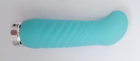 Close up of the Blush Novelties Exposed Nocturnal Vibrator Slanted Tip, at a 45 degree angle.